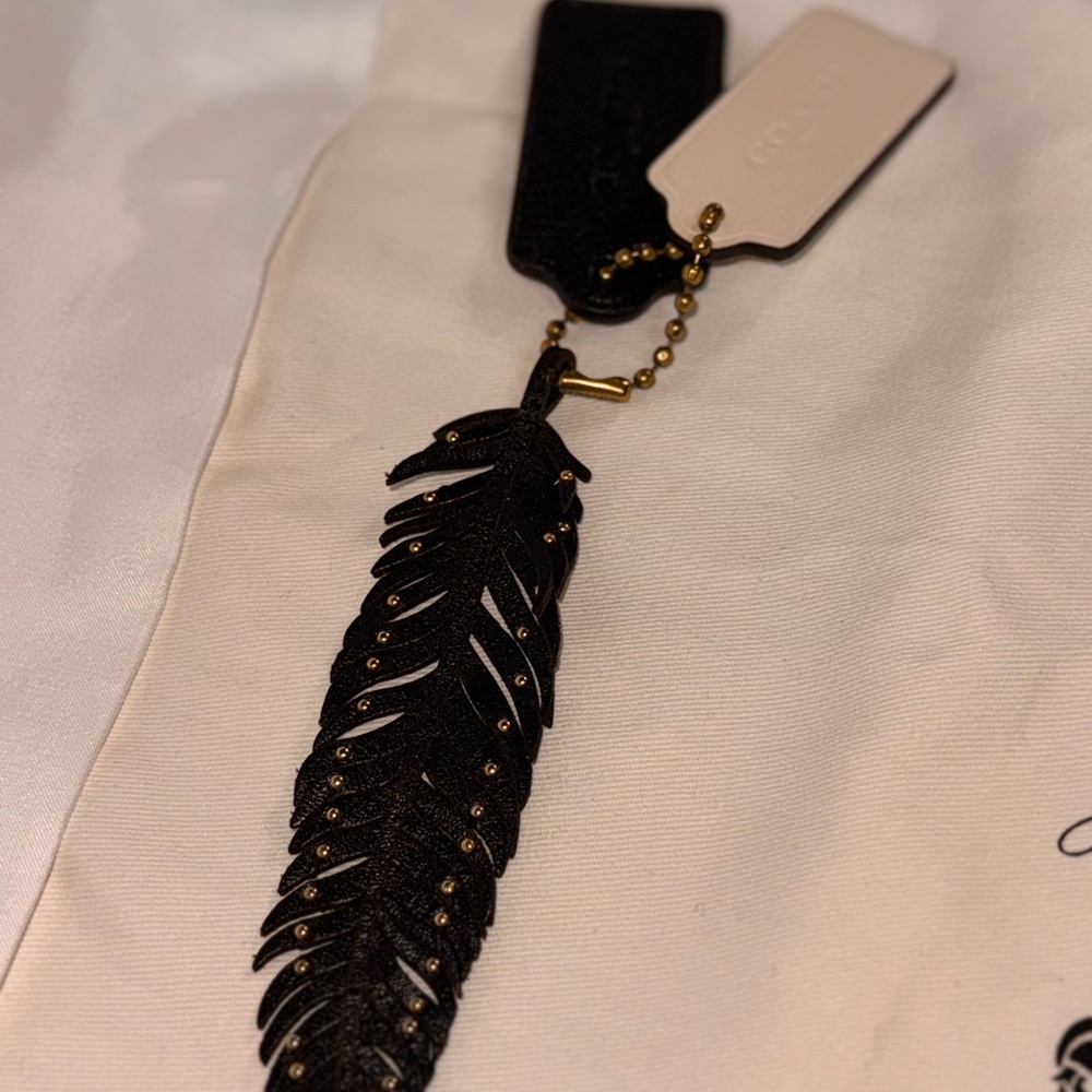 Coach Black Feather Keychain with Gold Details